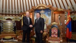 Mongolia's former president mocks Putin with a map showing how big the Mongol empire used to be and how small Russia was