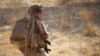 FILE - A soldier of the French Army monitors a rural area during the Barkhane operation in northern Burkina Faso on Nov. 10, 2019. 