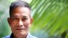FILE - Vietnamese blogger Nguyen Van Hai, pictured in October 2014, says it's time "for everyone to sit down to find ways to restore" his country, but "everyone must have a voice in the process." 