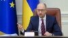 Ukrainian Prime Minister Arseniy Yatsenyuk speaks during a cabinet meeting in Kyiv, Ukraine, Nov. 25, 2015. 