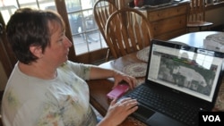 Shelley Finfrock has been testing Climate Basic to check the accuracy of its rainfall estimates and other features. (V. LaCapra/VOA) 