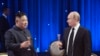 Russian President Vladimir Putin, right, toasts with North Korea's leader Kim Jong Un after their talks in Vladivostok, Russia, April 25, 2019. 
