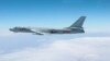 A Chinese military plane H-6 bomber flies through airspace between Okinawa prefecture's main island and the smaller Miyako island in southern Japan, in this handout photo taken Oct. 27, 2013 by Japan Air Self-Defense Force. 