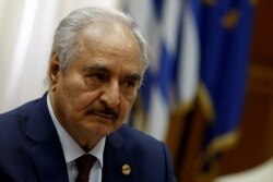 FILE - Libyan commander Khalifa Haftar is pictured at the Parliament in Athens.