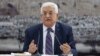 Palestinian President Mahmoud Abbas talks during a leadership meeting in Ramallah, April 1, 2014
