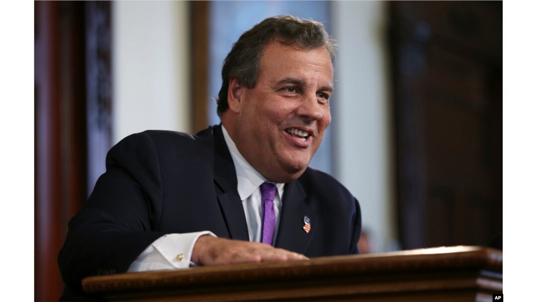 FILE - New Jersey Gov. Chris Christie laughs at a question from the media after speaking in Trenton, N.J.