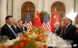 : President Donald Trump with China's President Xi Jinping during their bilateral meeting, Dec. 1, 2018 in Buenos Aires, Argentina.