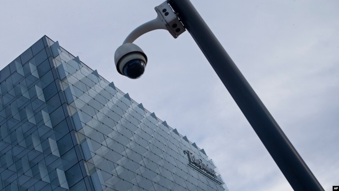 A security camera stands outside the main Telefonica headquarters in Madrid, Spain, May 12, 2017. The Spanish government said several companies including Telefonica had been targeted in ransomware cyberattack that affected the Windows operating system of employees' computers.