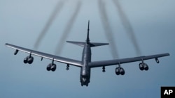 FILE - This Air Force photo shows a B-52H Stratofortress, May 21, 2019. Two of these bombers have flown over a swath of the Middle East, sending what U.S. officials say is a message of deterrence to Iran.