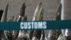 Similar to a recent seizure by Philippines officials, part of a shipment of 33 rhino horns seized by Chinese customs agents displayed at news conference, Hong Kong, Nov. 15, 2011.