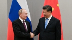 VOA Asia - Russia and China collaborate