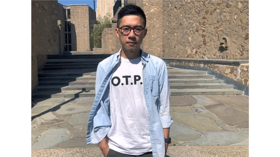 Nathan Law, a Hong Kong democracy activist and current graduate student at Yale, poses on the school campus in New Haven, Conn., Sept. 23, 2019.