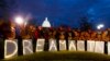 FILE - Demonstrators rally in support of Deferred Action for Childhood Arrivals (DACA) outside the Capitol, in Washington, Jan. 21, 2018.