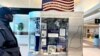 A display in Manchester's airport promotes New Hampshire's first-in-the-nation presidential primary tradition. (Steve Herman/VOA) 