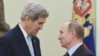 FILE - U.S. Secretary of State John Kerry, left, speaks with Russia's President Vladimir Putin during a meeting at the Kremlin in Moscow, Dec. 15, 2015.