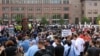 Protesters gather in the Public Square in downtown Cleveland, where the Republican National Convention is being held, July 18, 2016. Presumptive presidential nominee Donald Trump will give a speech Thursday, the final night of the convention.