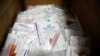 FILE - Trial kits for Pfizer's COVID-19 vaccination study are seen at the Research Centers of America, in Hollywood, Florida, Sept. 24, 2020.
