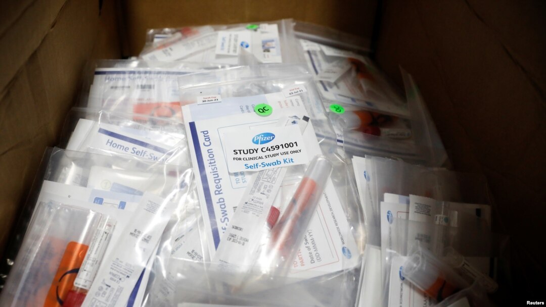 FILE - Trial kits for Pfizer's COVID-19 vaccination study are seen at the Research Centers of America, in Hollywood, Florida, Sept. 24, 2020.