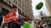 Climate change activists march in downtown Philadelphia ahead of the Democratic National Convention, July 24, 2016. 