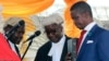 FILE - The Patriotic Front's Edgar Lungu, right, is sworn in as president at an inauguration ceremony in Lusaka, Jan. 25, 2015. Lungu says he will nominate a female vice presidential running mate for his re-election bid in the August 11, 2016, general election. 