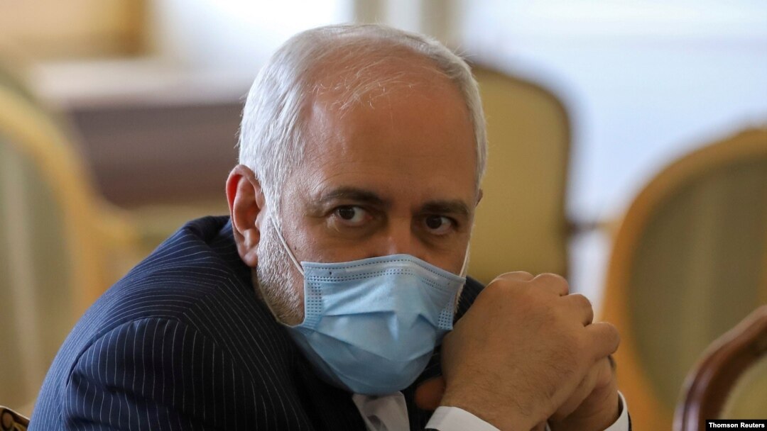 Iran's Foreign Minister Mohammad Javad Zarif looks on during a meeting with International Atomic Energy Agency (IAEA) Director General Rafael Grossi in Tehran, May 2021.
