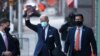 U.S. President-elect Joe Biden leaves a historic theater after participating in a virtual meeting on national security in Wilmington, Delaware, November 17, 2020.