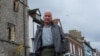 Veteran broadcaster Steve Vines is pictured in the British town of St. Albans after leaving Hong Kong over security concerns (Kris Cheng/VOA)