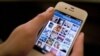 Instagram is demonstrated on an iPhone, in New York. (AP Photo/Karly Domb Sadof, File)