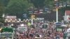 A crowd walks along part of the fair grounds at the Iowa State Fair, in the state capital Des Moines, August 12, 2011