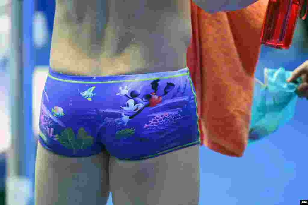 The swimming costume of China's Sun Yang, featuring famous US cartoon character Micky Mouse, is seen on July 25, 2019 during a training session at the 2019 World Championships at Nambu University Municipal Aquatics Center in Gwangju, South Korea.