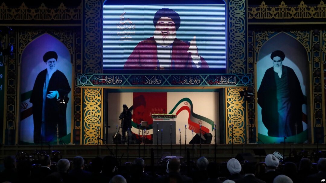 Hezbollah leader Hassan Nasrallah delivers a broadcast speech during a rally to commemorate the 40th anniversary of Iran's Islamic Revolution, in southern Beirut, Lebanon, Feb. 6, 2019. 