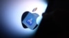 (FILES) This illustration photo shows the Apple app store logo reflected from an iPhone onto the back of an iMac in Los Angeles, August 26, 2021.