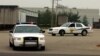 FILE - A photo shows two Indiana police cruisers.