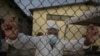 Doctor Bolivar Jalca, who is treating patients experiencing symptoms consistent with COVID-19, poses for a photograph outside Manglaralto Hospital, in Manglaralto, Ecuador, May 2, 2020.