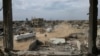 Humanitarian aid trucks enter through the Kerem Shalom crossing from Egypt into the Gaza Strip, in Rafah, Jan. 22, 2025.