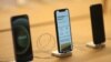 FILE PHOTO: IPhone 12 phones are seen at the new Apple Store on Broadway in downtown Los Angeles