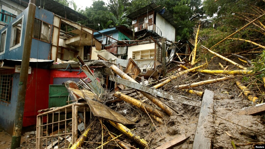 Houses damaged by a mudslide are seen during heavy rains of Tropical Storm Nate that affects the country in San Jose, Costa Rica, Oct. 5, 2017.