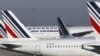 Air France planes are parked on the tarmac at Paris Charles de Gaulle airport, in Roissy, near Paris. (Feb 2012 photo)
