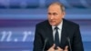 Russian President Vladimir Putin speaks during his annual news conference in Moscow, Dec. 17, 2015.