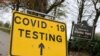 FILE - A sign is seen at the coronavirus disease (COVID-19) test centre at Stanley Park, near Anfield, on the first day of a newly imposed lockdown, in Liverpool, Britain, November 5, 2020.