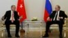 Turkish President Recep Tayyip Erdogan speaks to Russian President Vladimir Putin (R) during their meeting in St. Petersburg, Russia, August 9, 2016. 