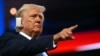 US former President and 2024 Republican presidential candidate Donald Trump points at the conclusion of the second day of the 2024 Republican National Convention at the Fiserv Forum in Milwaukee, Wisconsin, July 16, 2024.