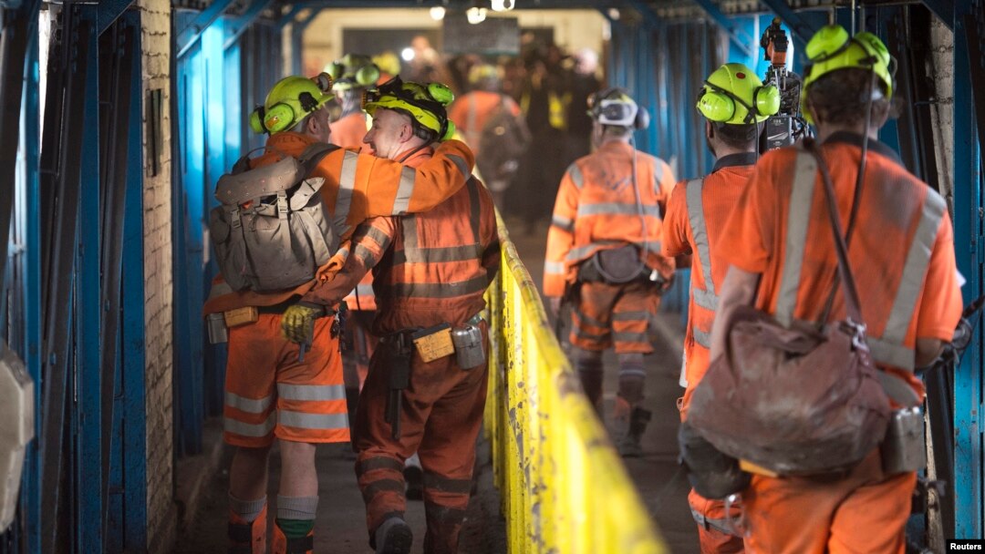 Miners leave after working the final shift at Kellingley Colliery on its last day of operation in north Yorkshire, England, Dec. 18, 2015. Kellingley is the last deep coal mine to close in England.