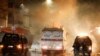 Security forces clash with demonstrators during anti-government protests in Tunis, Tunisia, Jan. 18, 2021. 