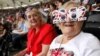 Spectators are pictured during the opening ceremony of the London 2012 Olympic Games at the Olympic Stadium July 27, 2012. 