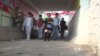 In China’s Guangzhou, Ebola and Crackdown on Illegals Hits Trade Hard