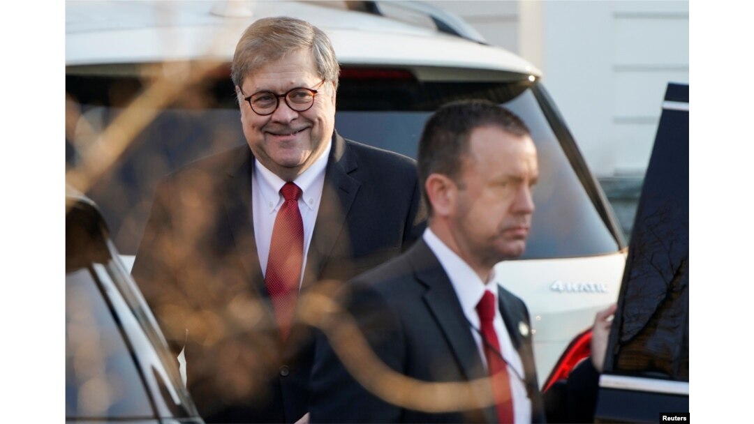 FILE - U.S. Attorney General William Barr leaves his house after Special Counsel Robert Mueller found no evidence of collusion between U.S. President Donald Trump’s campaign and Russia in the 2016 election in McLean, Virginia, March 25, 2019.