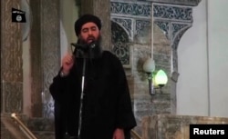 A video image of a man purported to be Abu Bakr al-Baghdadi, the reclusive leader of the Islamic State, in hi s first public appearance in Mosul on July 5, 2014.