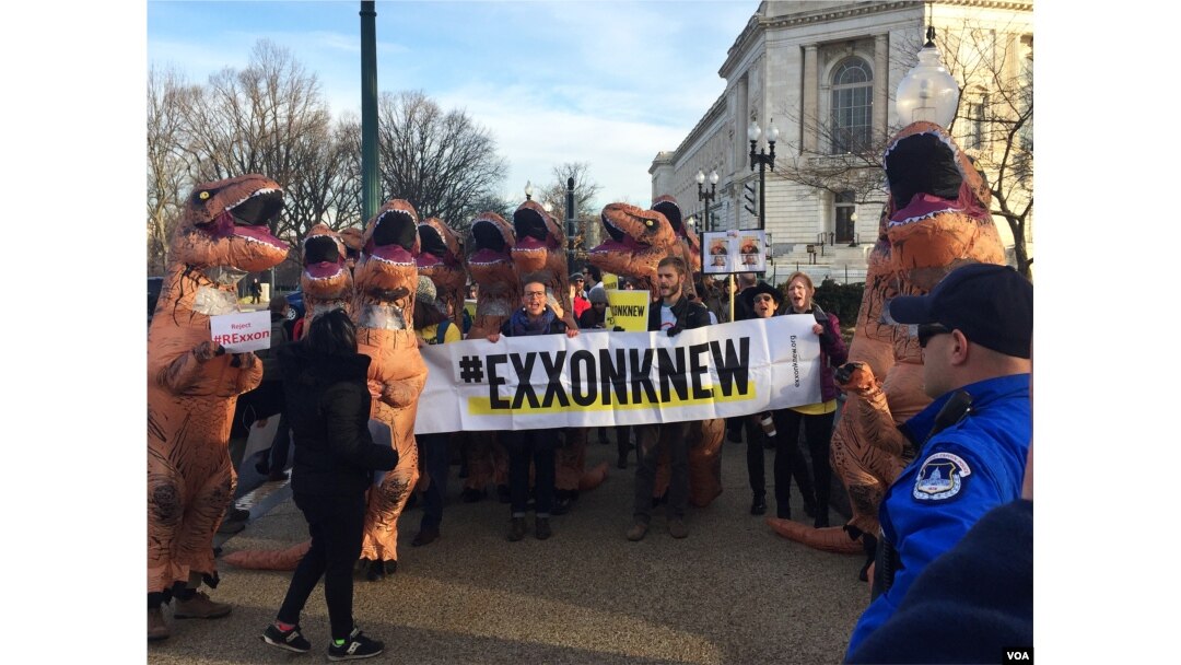 Protesters led by Greenpeace protest the Tillerson confirmation hearing on Capitol Hill, January 11, 2017 (K. Gypson / VOA)