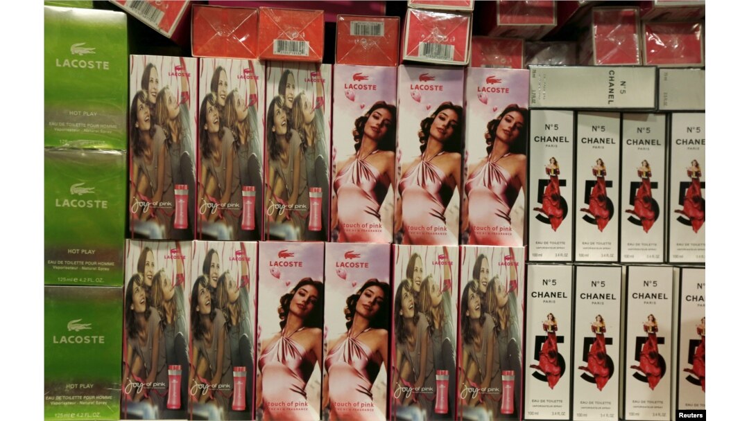FILE - Counterfeit perfumes are displayed at the Customs headquarters in Hong Kong, China, August 6, 2015.